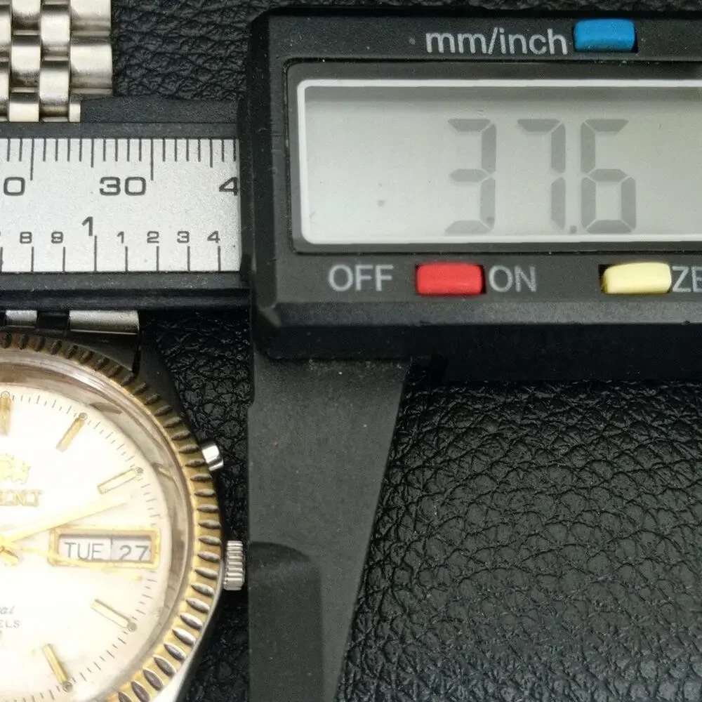 Vintage 1977 Orient Automatic Mens Silver Watch W/daydate & Gold accents